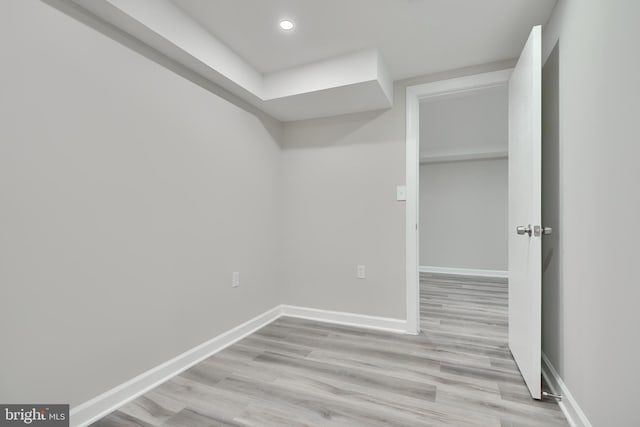 spacious closet with light hardwood / wood-style floors