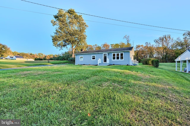 view of front of house with a front lawn