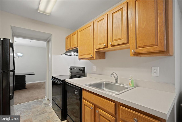 kitchen featuring black appliances and sink