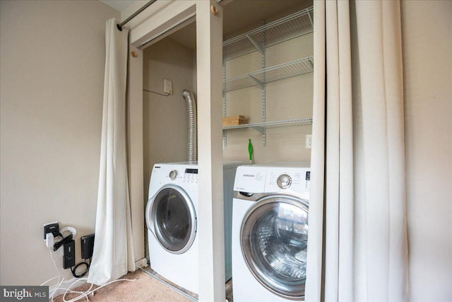 laundry area with independent washer and dryer