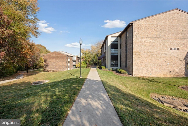 exterior space with a lawn