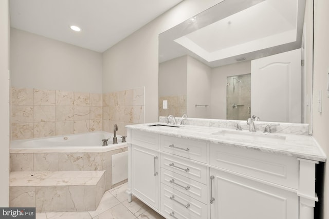 bathroom with vanity and plus walk in shower