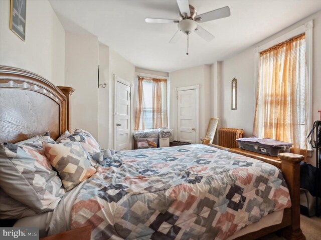 1337 S 54th St, Philadelphia, PA 19143 - bedroom with radiator heating unit and ceiling fan