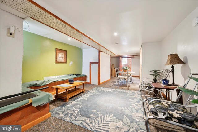 1337 S 54th St, Philadelphia, PA 19143 - living room featuring carpet
