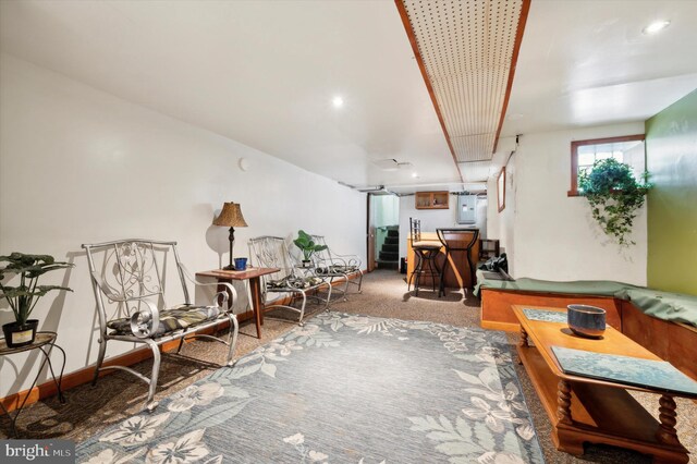 1337 S 54th St, Philadelphia, PA 19143 - carpeted living room featuring electric panel and baseboards