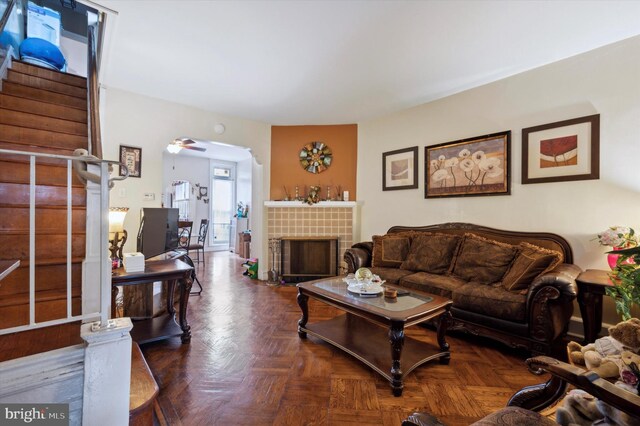 1337 S 54th St, Philadelphia, PA 19143 - living area with a tile fireplace and ceiling fan