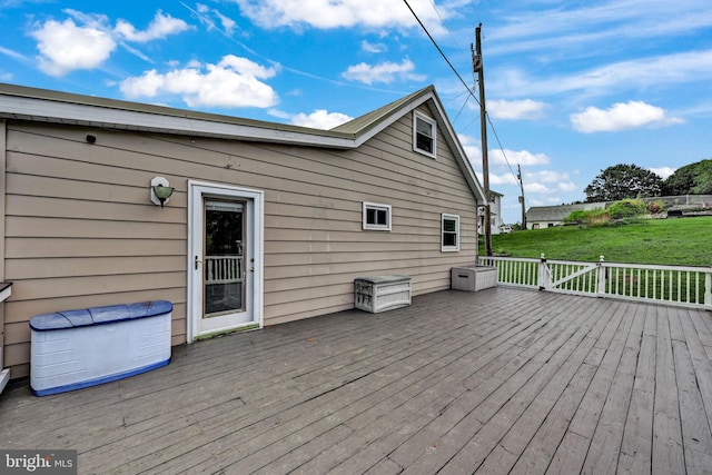 deck featuring a lawn