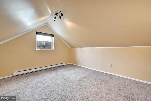 bonus room with baseboard heating, carpet floors, and vaulted ceiling