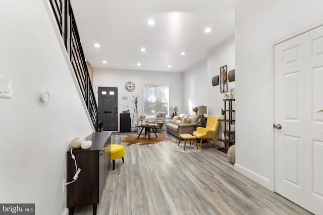 living room with light hardwood / wood-style floors