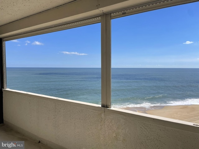 property view of water with a beach view