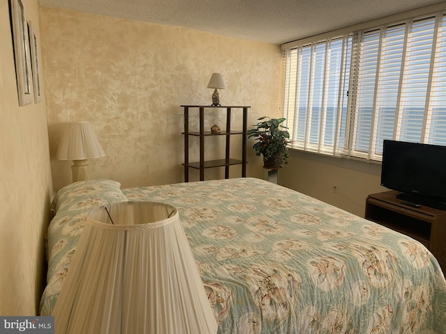 bedroom with a textured ceiling