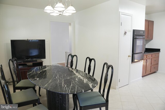 dining room with a chandelier