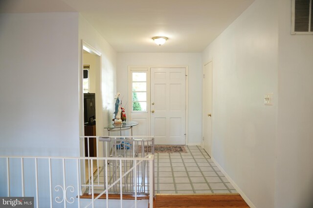 foyer featuring hardwood / wood-style floors