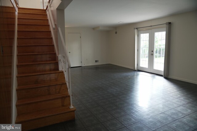 empty room featuring french doors