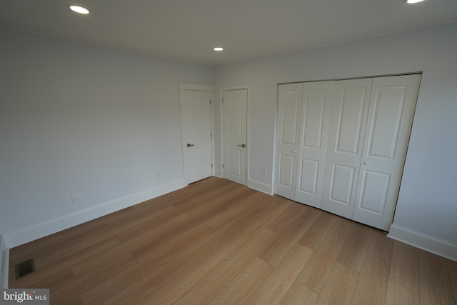 unfurnished bedroom featuring light hardwood / wood-style flooring