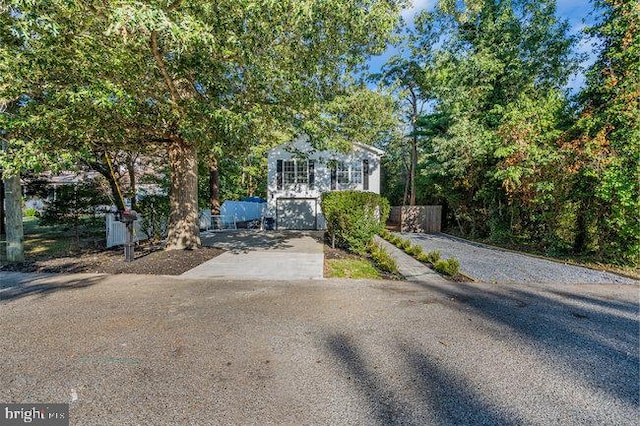 view of property hidden behind natural elements