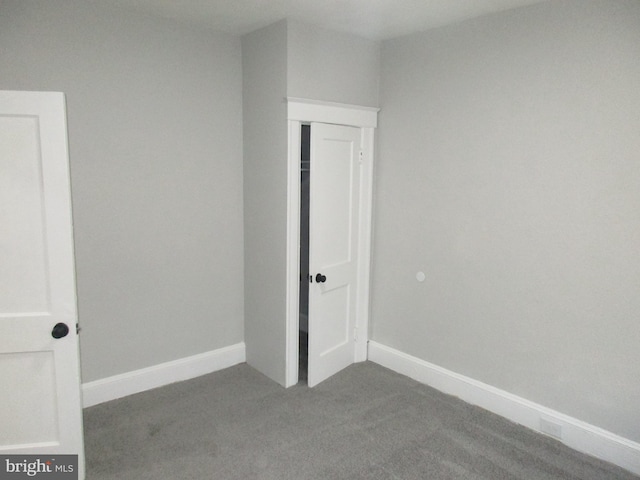 unfurnished bedroom featuring carpet floors