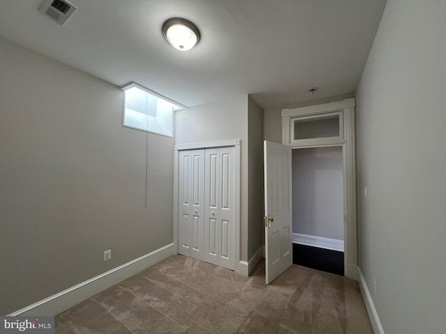 unfurnished bedroom with carpet floors