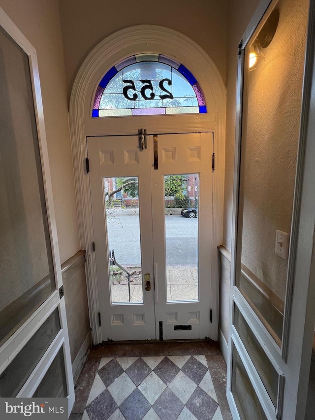 entrance foyer with tile patterned floors