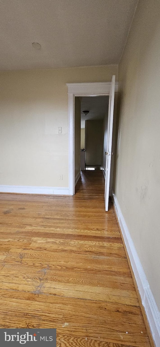 corridor featuring light hardwood / wood-style flooring