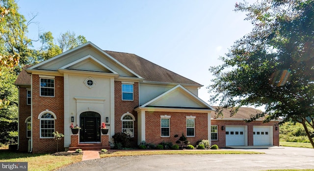 view of front of home with a garage