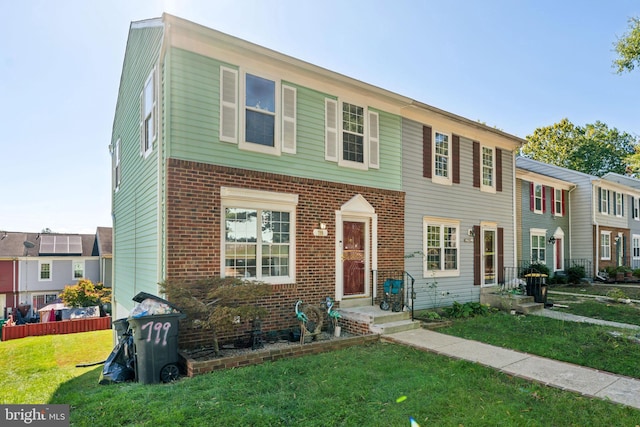 view of front facade with a front lawn