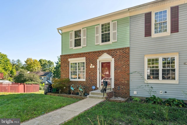 view of front of property with a front lawn