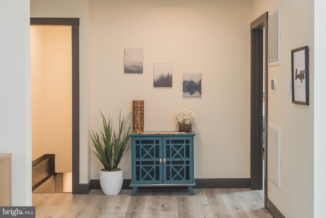 hall featuring light wood-type flooring