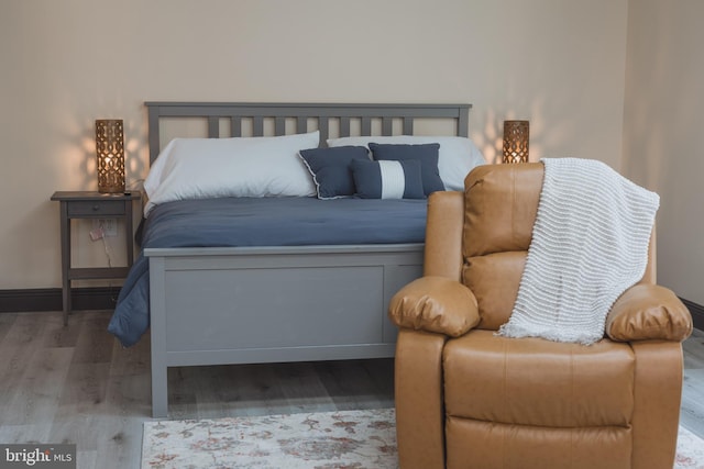 bedroom featuring hardwood / wood-style floors