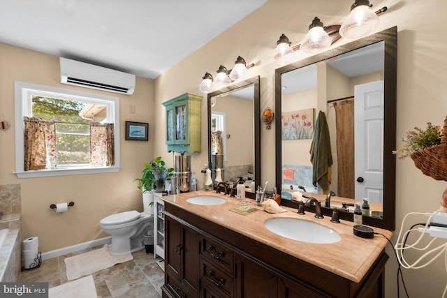 bathroom with vanity, toilet, a tub to relax in, and a wall mounted air conditioner