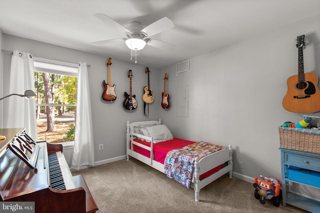 bedroom with ceiling fan and carpet flooring