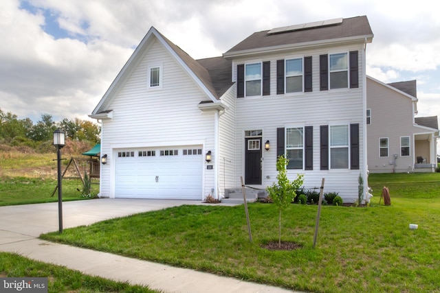 100 Powder Ridge Ln, York, PA 17404 - traditional-style home with a front lawn, roof mounted solar panels, a garage, and concrete driveway