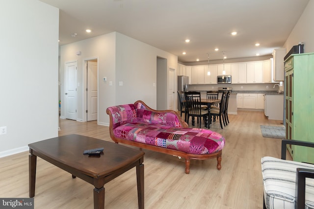 living room featuring light wood-type flooring