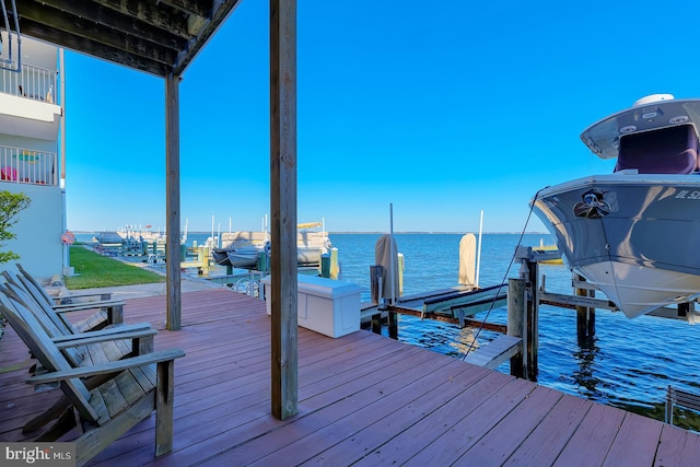 dock area with a water view