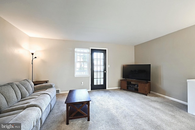 living room with light colored carpet