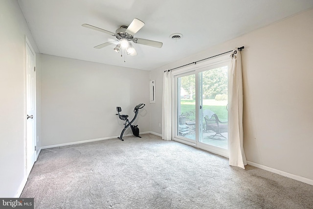 carpeted empty room with ceiling fan