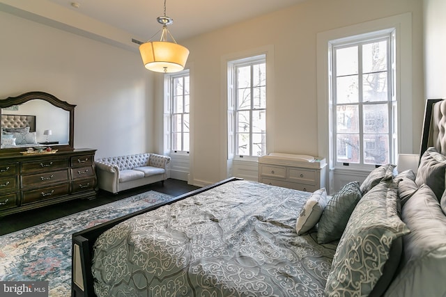 bedroom featuring multiple windows