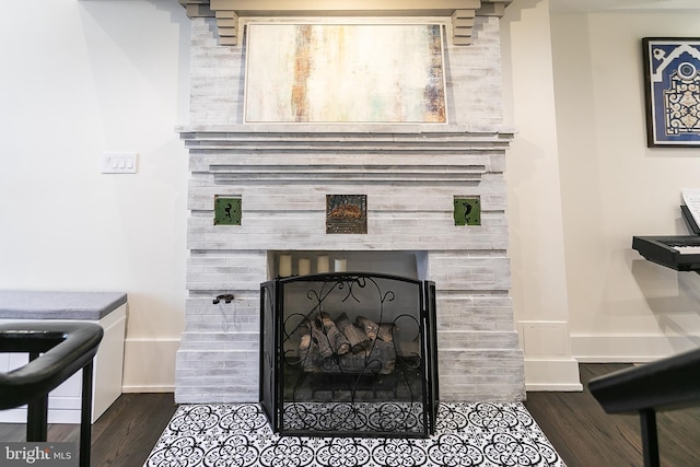 1508 Pine St Unit A, Philadelphia, PA 19102 - room details with baseboards, a tile fireplace, and wood finished floors
