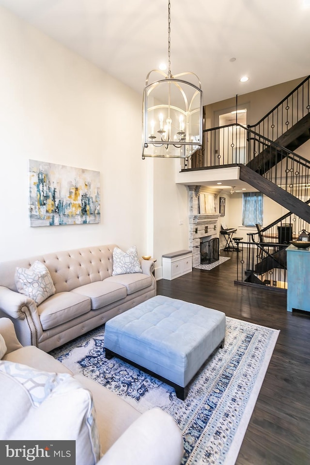 1508 Pine St Unit A, Philadelphia, PA 19102 - living room with stairs, recessed lighting, an inviting chandelier, and wood finished floors