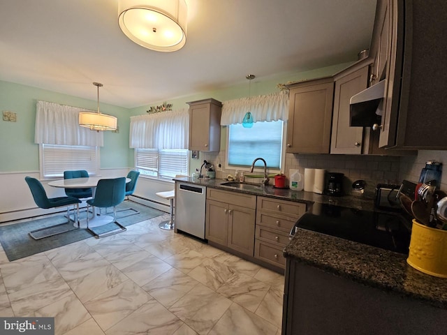 kitchen featuring backsplash, exhaust hood, decorative light fixtures, stainless steel dishwasher, and sink