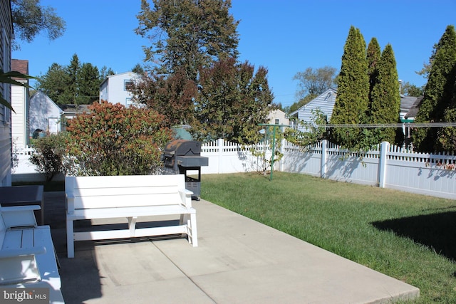 view of patio with a grill