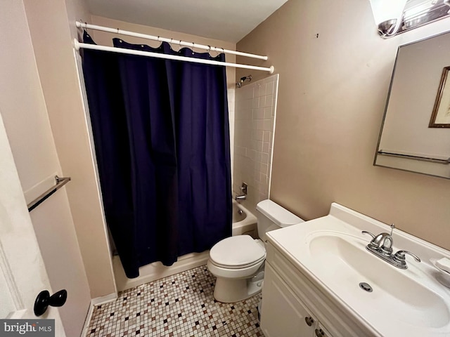 full bathroom with vanity, toilet, tile patterned floors, and shower / bath combo