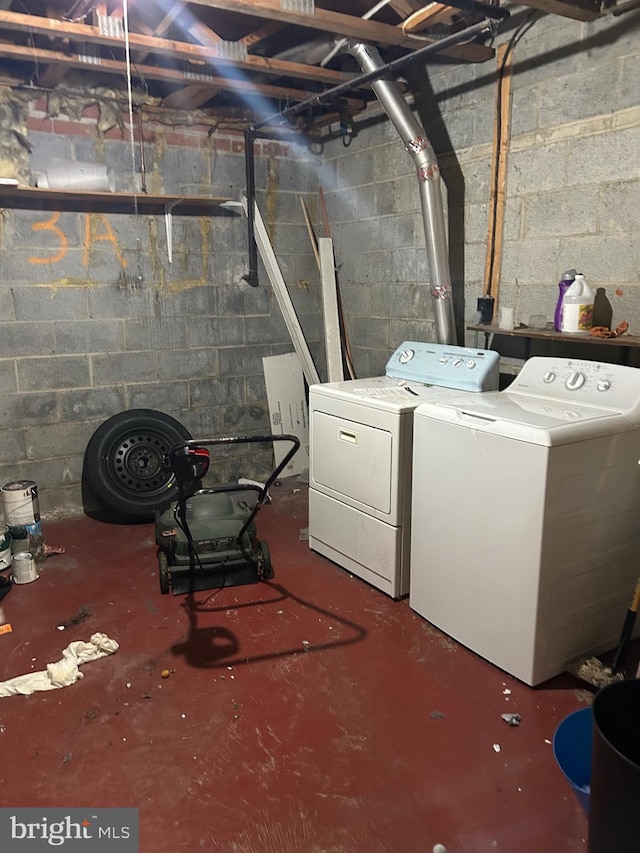 basement with washer and clothes dryer