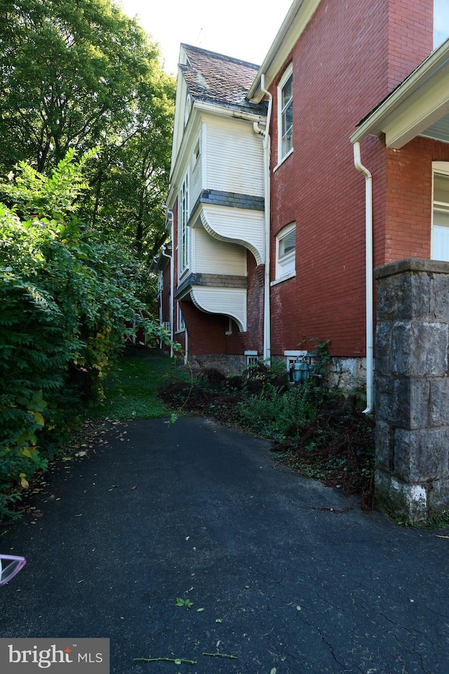 130 E Linn St, Bellefonte, PA 16823 - view of property exterior featuring brick siding