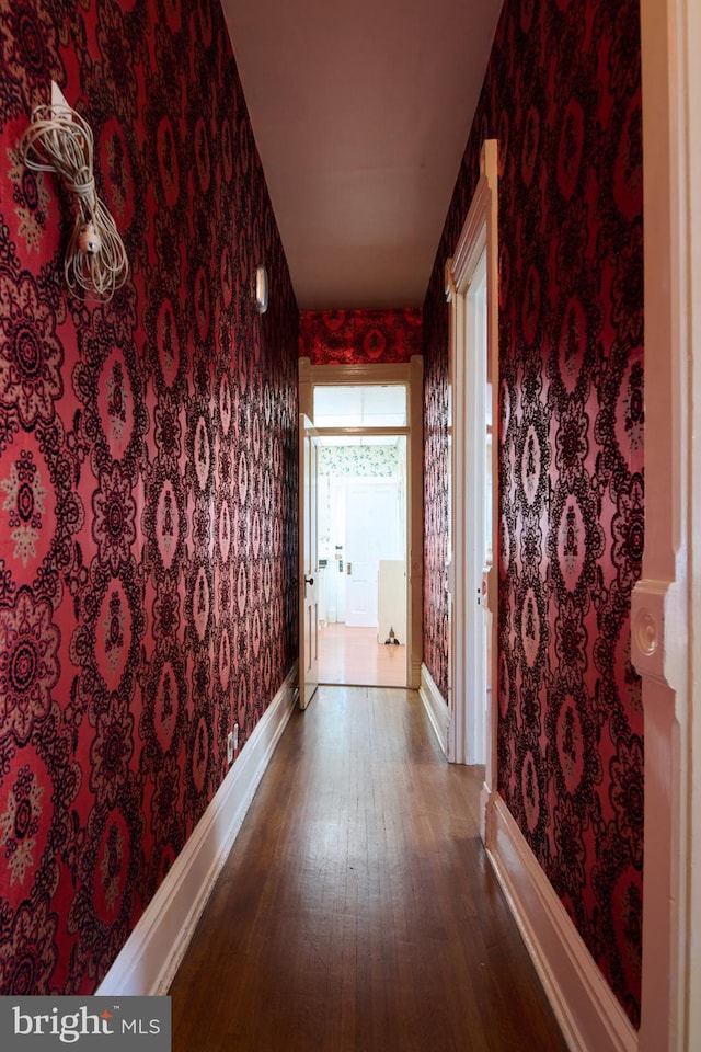 hallway featuring hardwood / wood-style flooring