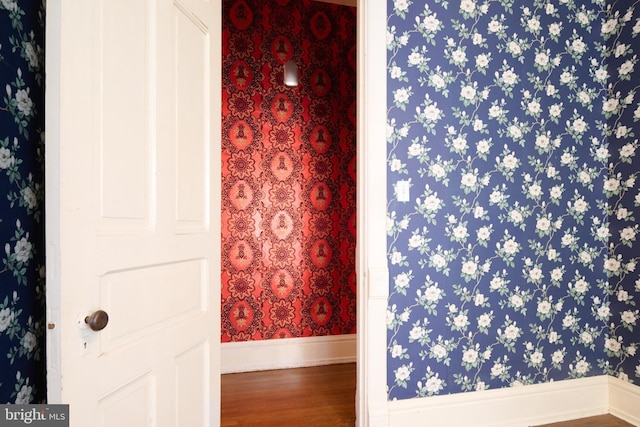 130 E Linn St, Bellefonte, PA 16823 - bathroom with wallpapered walls, wood finished floors, and baseboards