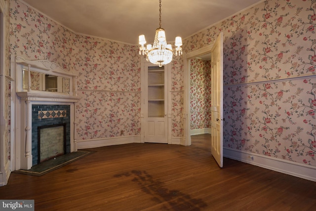 130 E Linn St, Bellefonte, PA 16823 - unfurnished living room with baseboards, wallpapered walls, a chandelier, a tile fireplace, and wood finished floors
