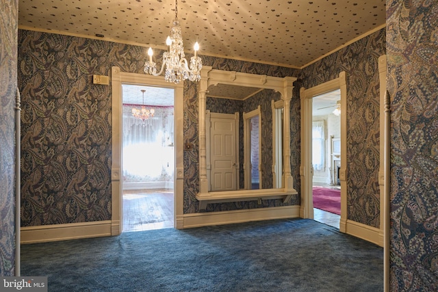 interior space featuring ceiling fan with notable chandelier