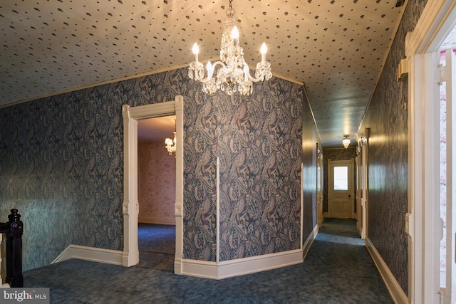 130 E Linn St, Bellefonte, PA 16823 - interior space with carpet floors, baseboards, an inviting chandelier, and wallpapered walls