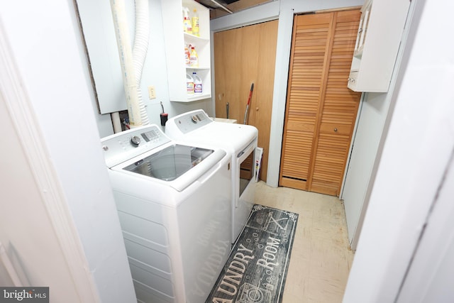 laundry area featuring washing machine and dryer